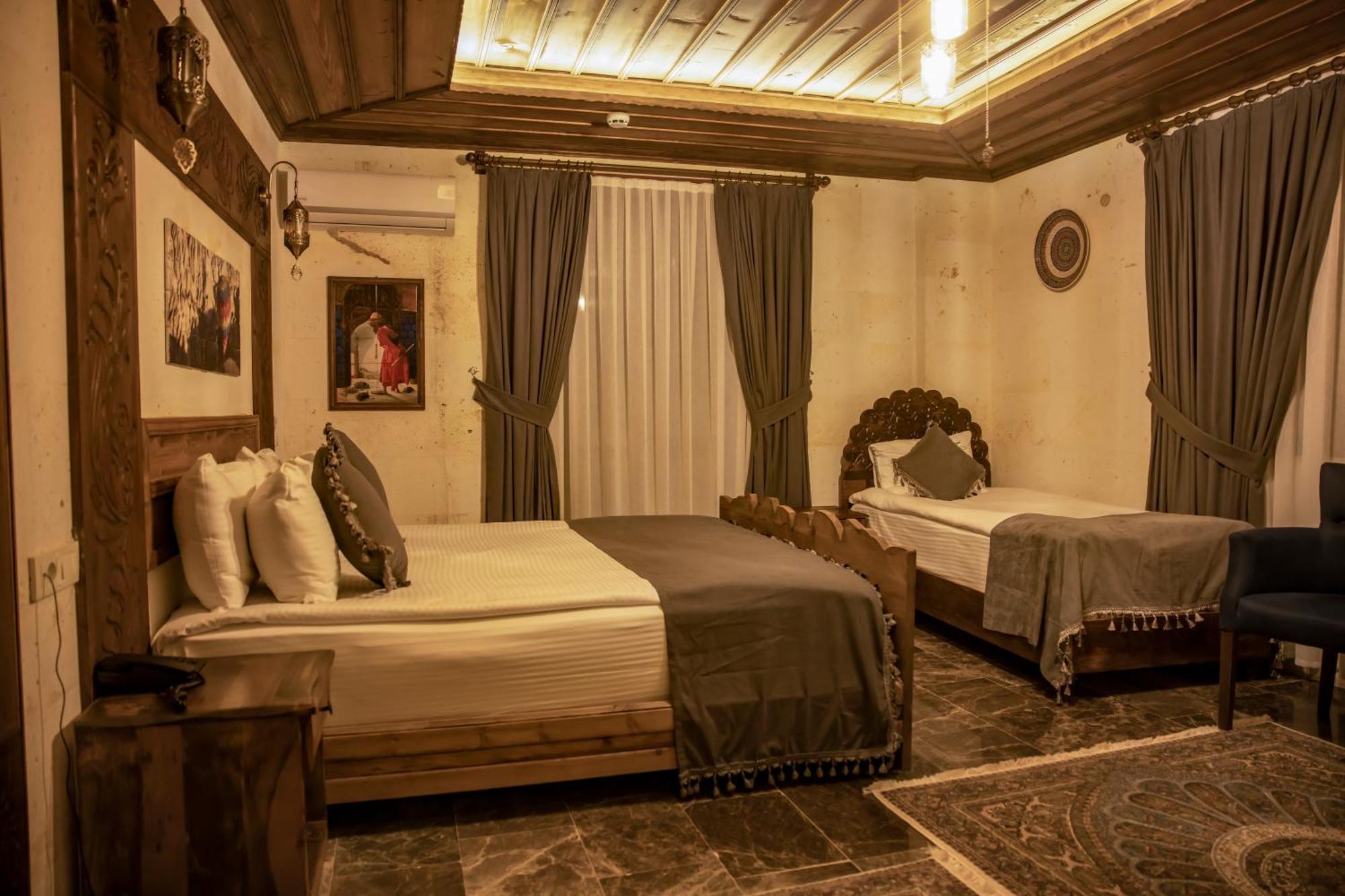 Garden Suites Hotel Cappadocia Гьореме Стая снимка