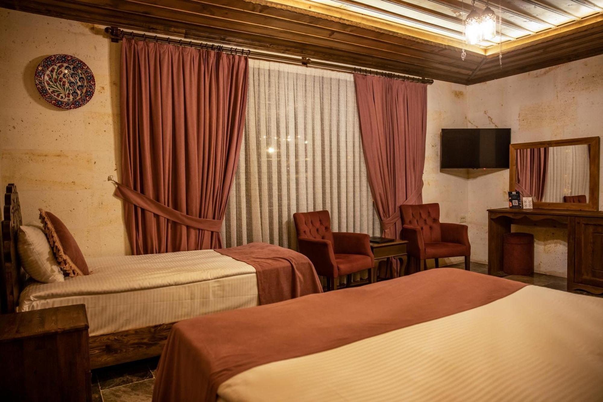 Garden Suites Hotel Cappadocia Гьореме Стая снимка