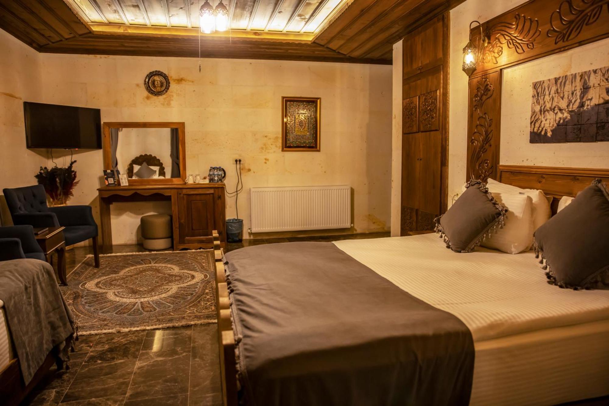 Garden Suites Hotel Cappadocia Гьореме Стая снимка