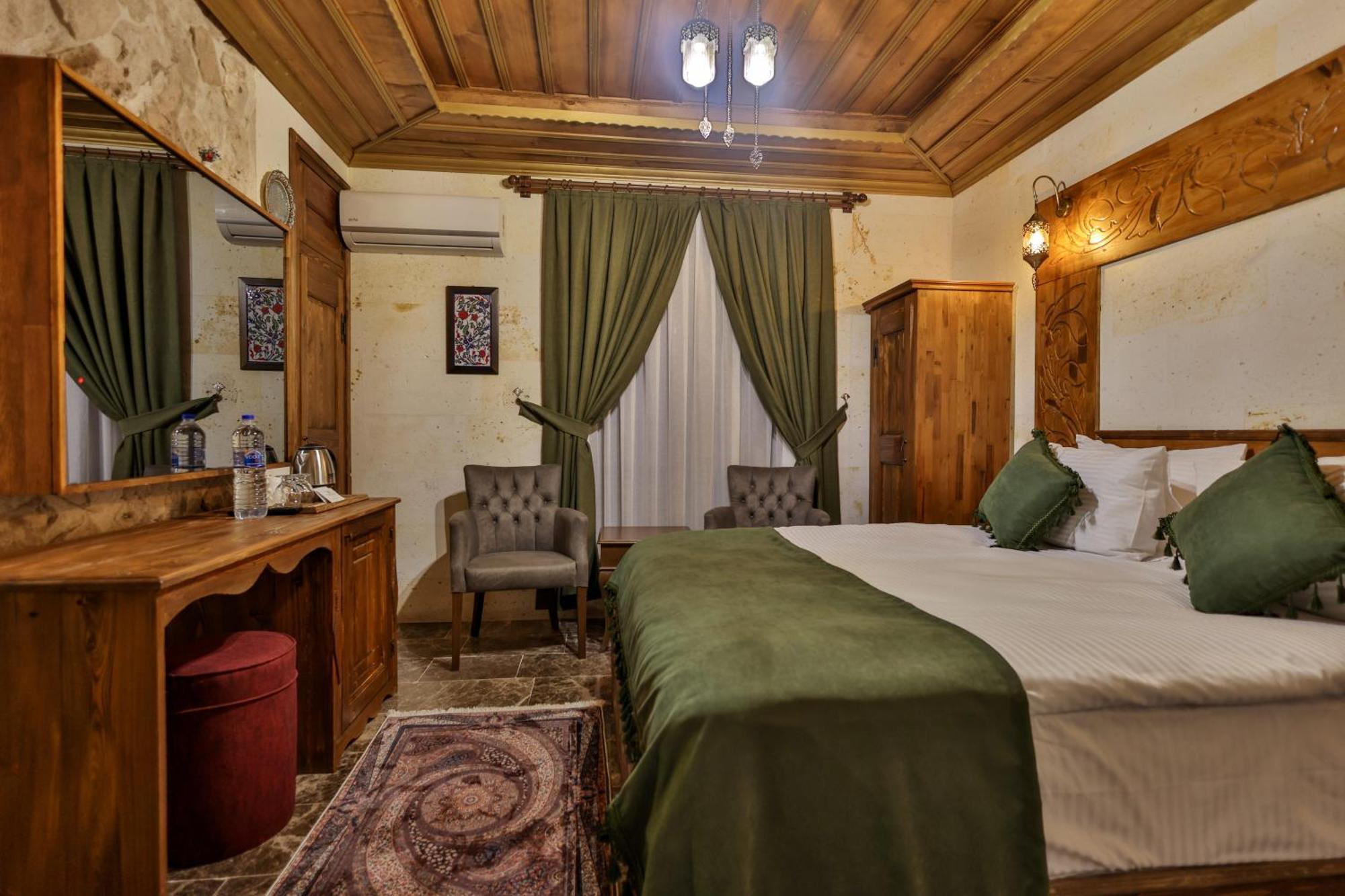Garden Suites Hotel Cappadocia Гьореме Стая снимка