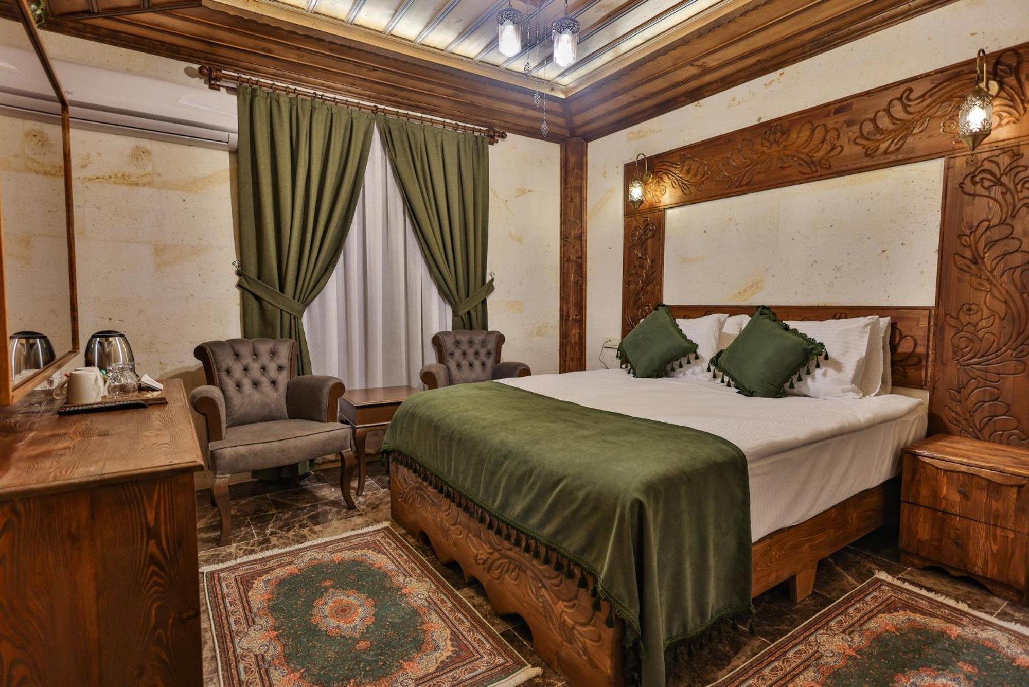 Garden Suites Hotel Cappadocia Гьореме Стая снимка
