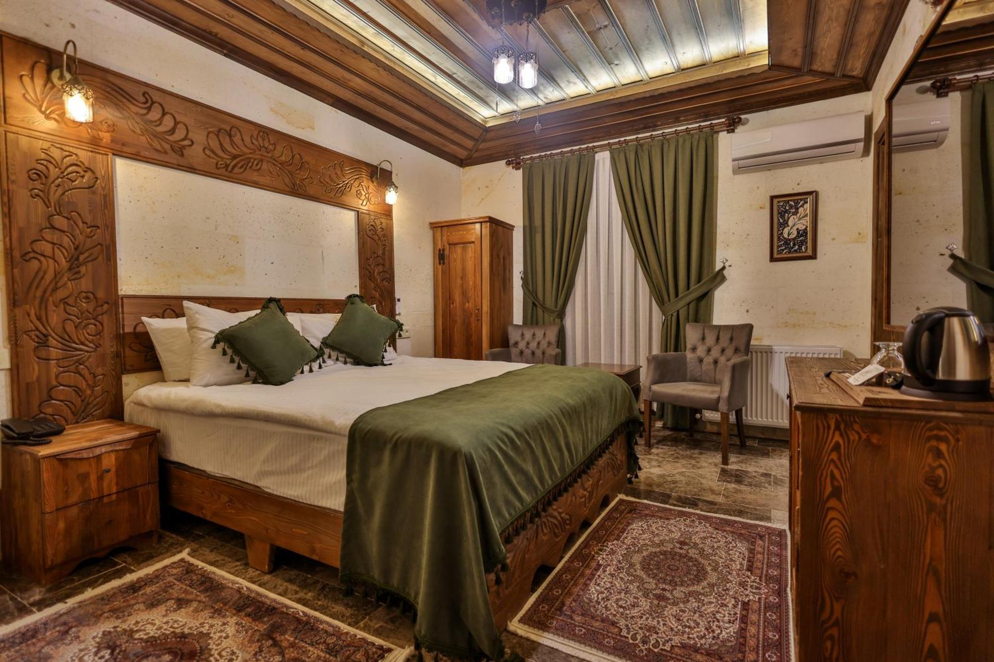 Garden Suites Hotel Cappadocia Гьореме Стая снимка