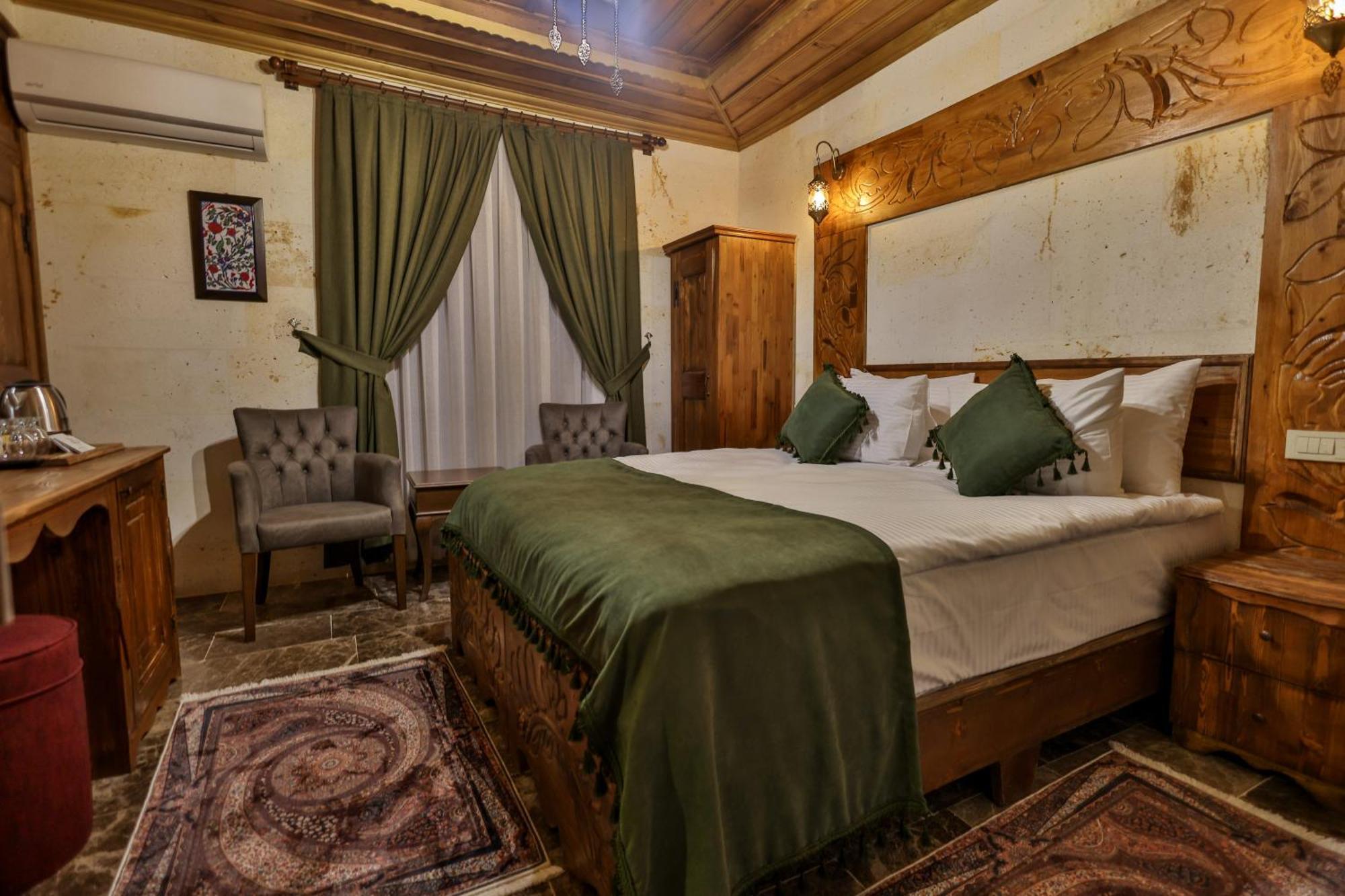 Garden Suites Hotel Cappadocia Гьореме Стая снимка