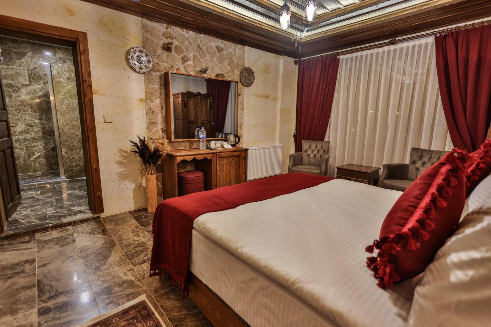 Garden Suites Hotel Cappadocia Гьореме Стая снимка