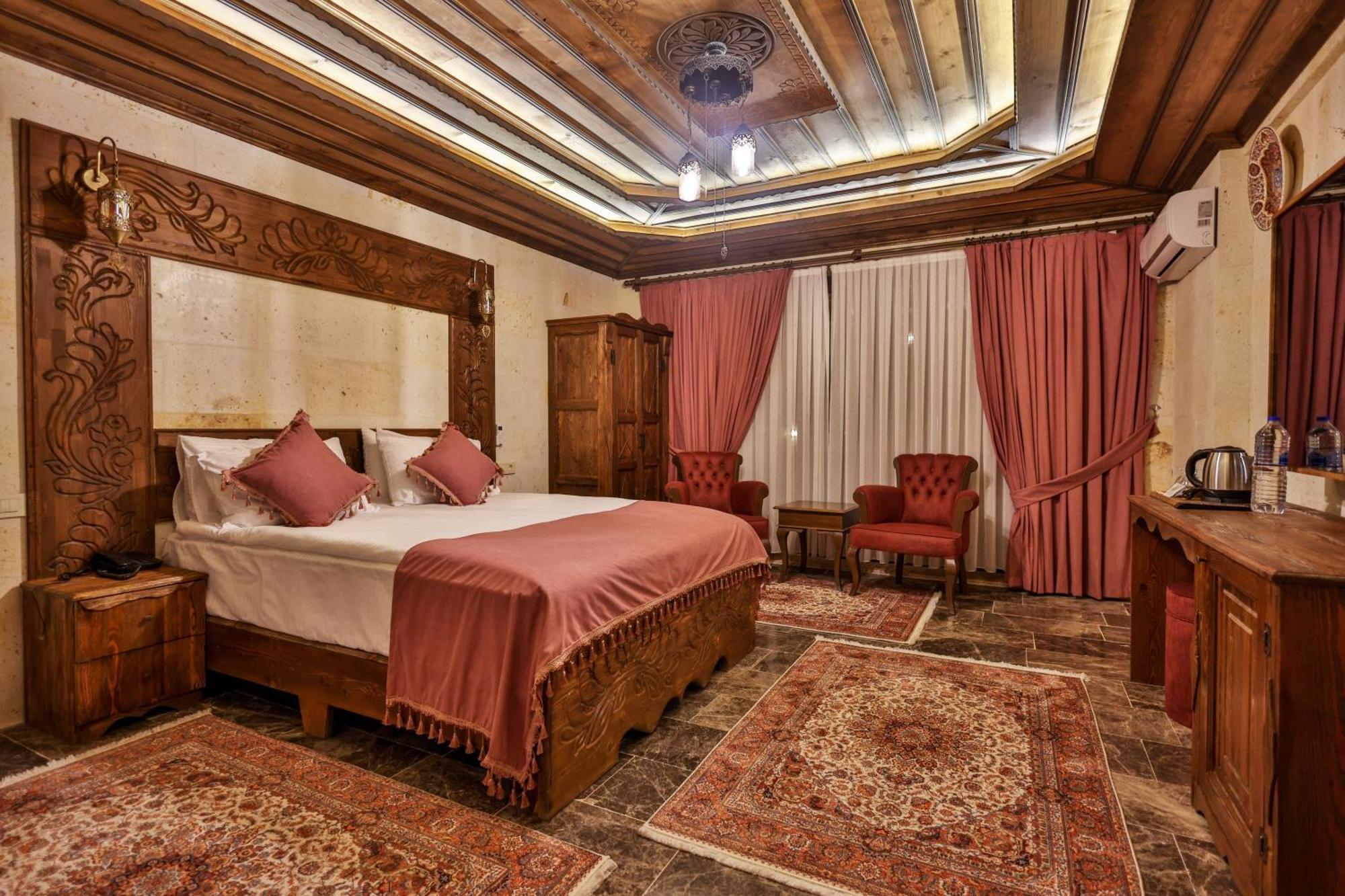 Garden Suites Hotel Cappadocia Гьореме Стая снимка